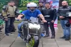 Watch: Union Minister Anurag Thakur Rides Bike Ahead Of Racing Event In UP Watch: Union Minister Anurag Thakur Rides Bike Ahead Of Racing Event In UP
