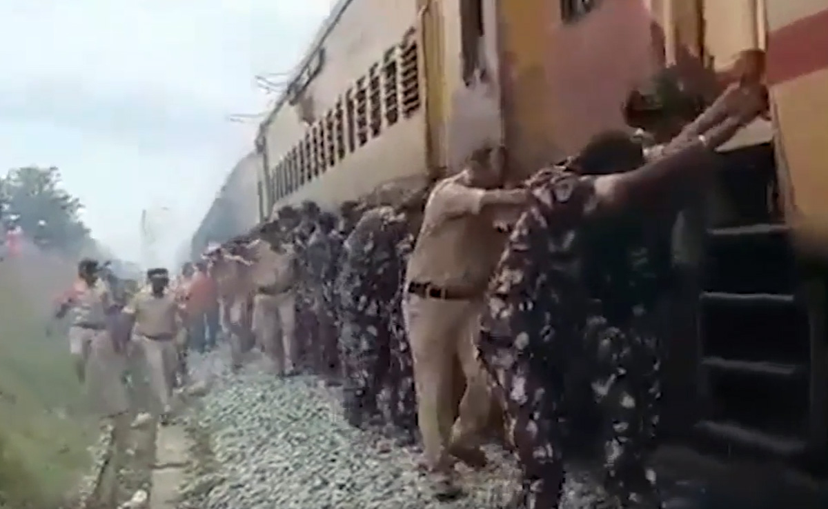 Video: Cops, Railways Staff Push Train Coach Away From Fire