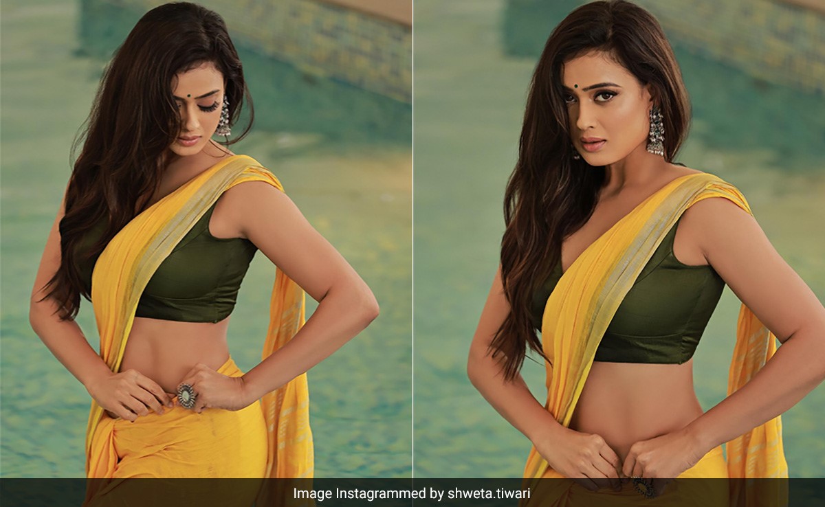 Shweta Tiwari Serves Quintessential Bollywood Glamour In A Pool Wearing A Stunning Yellow <i>Saree</i>