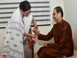 Mamata Banerjee Ties Rakhi to Uddhav Thackeray Ahead Of Mega Mumbai Meet Mamata Banerjee Ties Rakhi to Uddhav Thackeray Ahead Of Mega Mumbai Meet