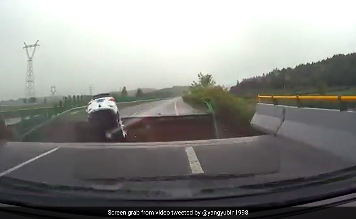 Shocking Video Shows Car Plunging Into Massive Crater In China As Rain Destroys Roads