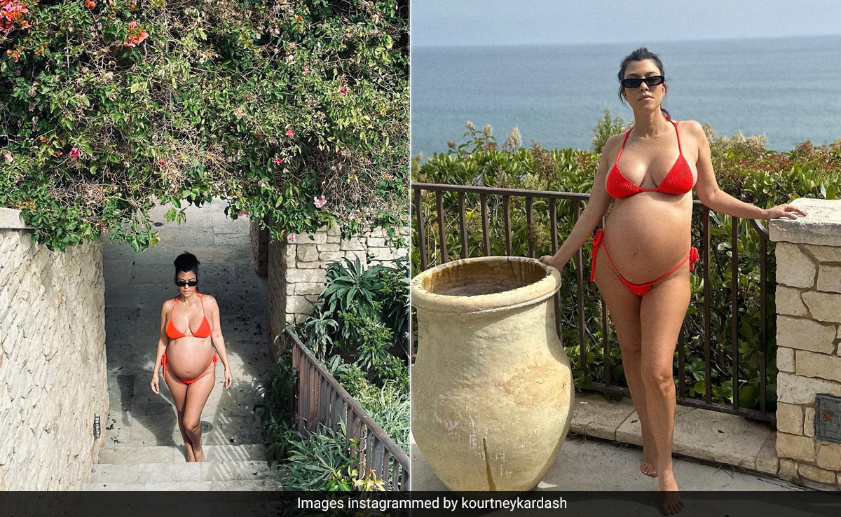 Kourtney Kardashian's Vibrant Red Baby Bump-Baring Swim Set Is Giving Maternity Chic An Upgrade
