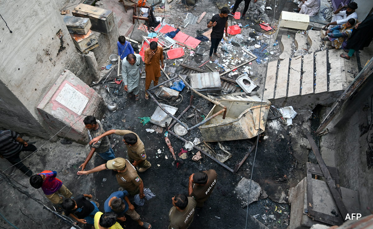 Christians Pray Among Rubble Of Vandalised Church In Pakistan
