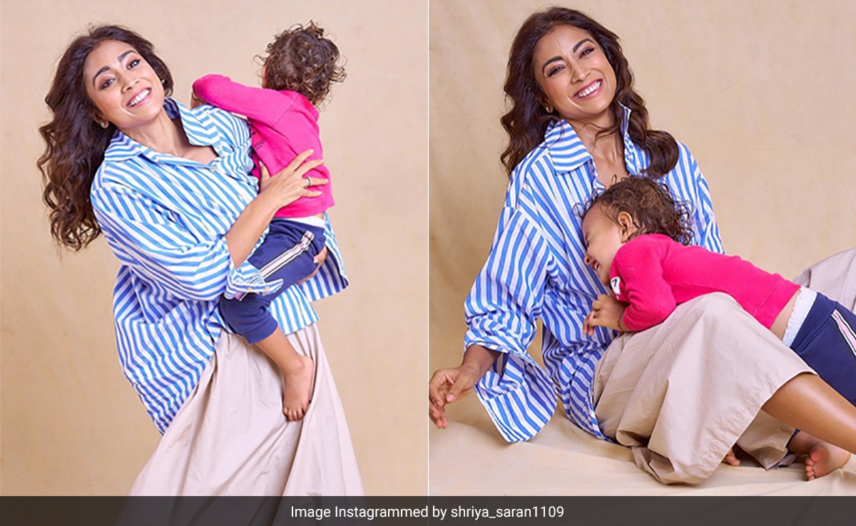 With A Beaming Smile, Shriya Saran Has Her Arms Full Of With Her "World"; Her Daughter Radha