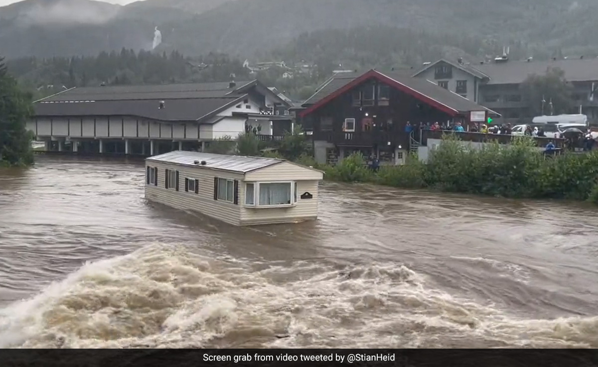 Video: Two Mobile Homes Swept Away In Norway Floods, Crashes Into Bridge