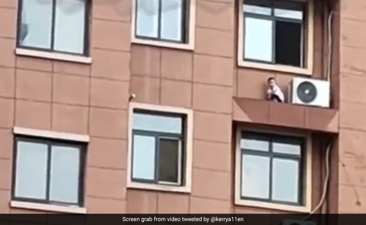 Shocking Video Shows Child Playing On Window Ledge Of High-Rise Building In China