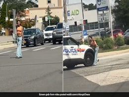 Watch: US Woman Points Gun At Cars On Intersection, Cop Drives Cruiser Into Her Watch: US Woman Points Gun At Cars On Intersection, Cop Drives Cruiser Into Her
