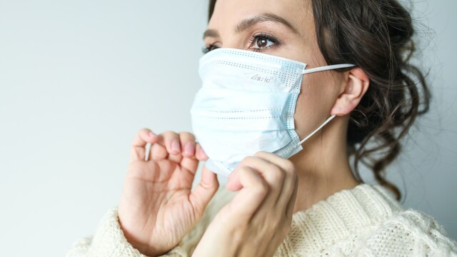 Wear a mask in closed crowded spaces if you are noticing cases rise around you