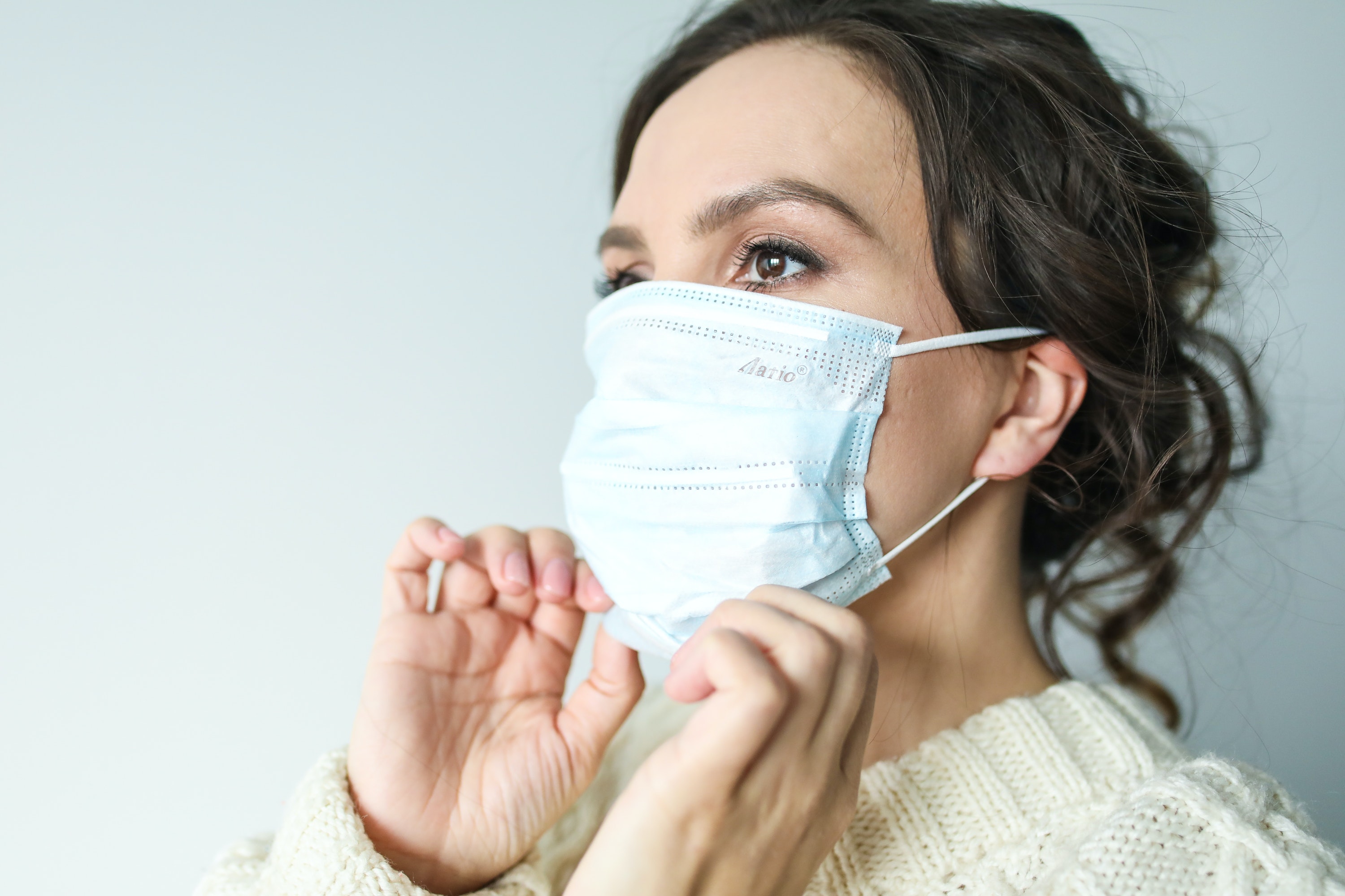 Wear a mask in closed crowded spaces if you are noticing cases rise around you