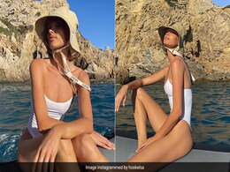 Elsa Hosk's Beach Day Came With A Chic White Swimsuit And ₹35K Loewe Bucket Hat Elsa Hosk's Beach Day Came With A Chic White Swimsuit And ₹35K Loewe Bucket Hat
