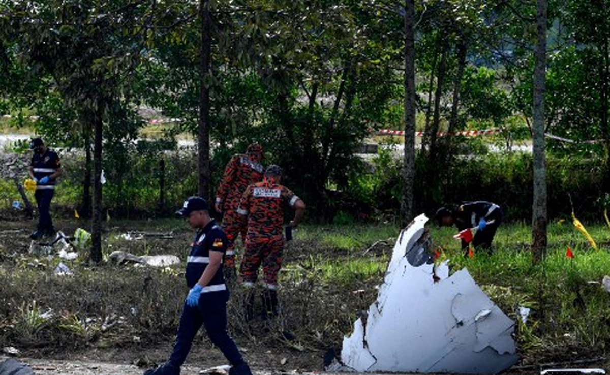 10 Killed As Light Plane Crashes Into Street In Malaysia