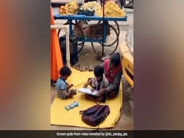 Watch: Fruit Seller Teaches Her Kids Near Roadside Stall, Video Goes Viral Watch: Fruit Seller Teaches Her Kids Near Roadside Stall, Video Goes Viral