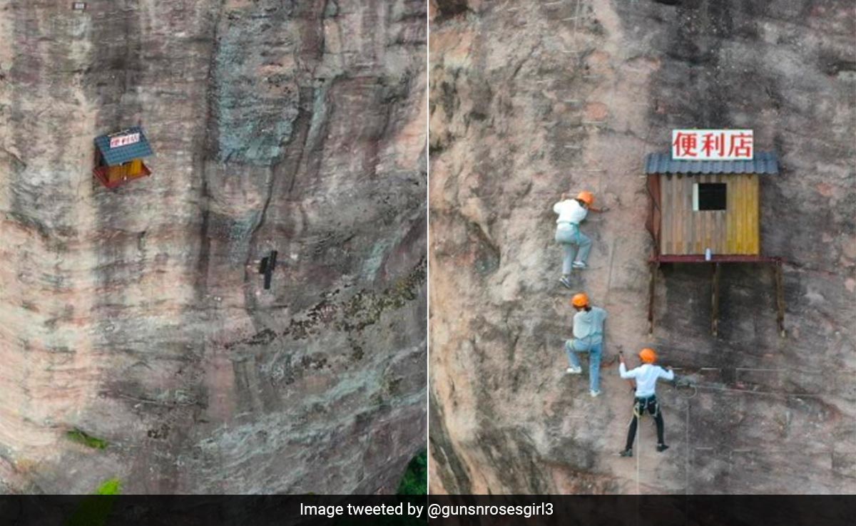This Tiny Store Hangs From A Large Cliff in China, Sells Snacks To Rock Climbers
