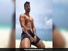 Varun Dhawan's Beach Holiday OOTD: Blue Shorts And Chiseled Abs Varun Dhawan's Beach Holiday OOTD: Blue Shorts And Chiseled Abs