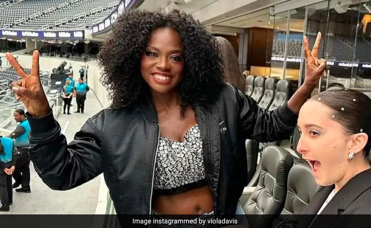 At Age 58, Viola Davis Exudes Casual Glam In An Embellished Bralette And Bomber Jacket