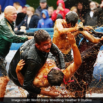 Watch: These Contestants Wrestled Each Other In A Pool Filled With Gravy, Here's Why - Vimarsana News