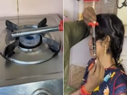 महिला के बालों को घुमावदार बनाने के लिए शख्स ने लगाया तगड़ा जुगाड़, गैस लाइटर से किया कर्ल महिला के बालों को घुमावदार बनाने के लिए शख्स ने लगाया तगड़ा जुगाड़, गैस लाइटर से किया कर्ल