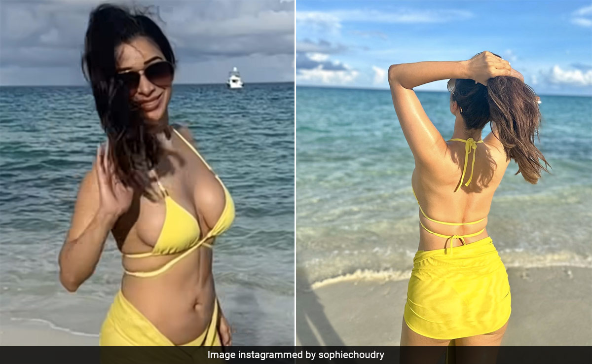 Sophie Choudry's "Last Of Summer" Includes A Bright Yellow Swim Set On The Beach