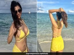 Sophie Choudry's "Last Of Summer" Includes A Bright Yellow Swim Set On The Beach Sophie Choudry's "Last Of Summer" Includes A Bright Yellow Swim Set On The Beach