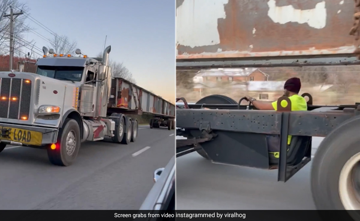 सड़क पर भागता दिखा बड़ा सा ट्रक, न ओर दिखा न छोर, पहियों के बीच चल रहे ड्राइवर ने खींच लिया ध्यान