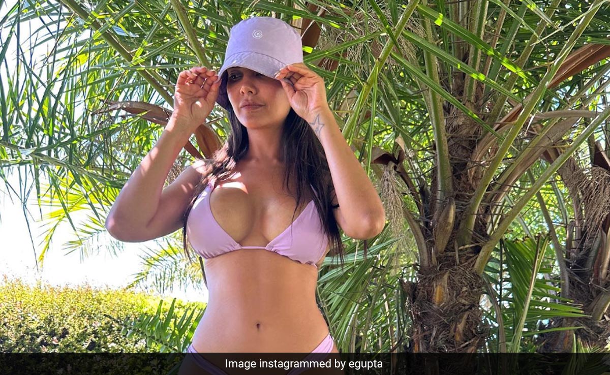 Esha Gupta's Throwback To This Swimwear Moment In Portugal Is Lavender Love At Its Finest