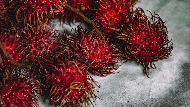 Rambutan is often consumed fresh and has a sweet and slightly acidic