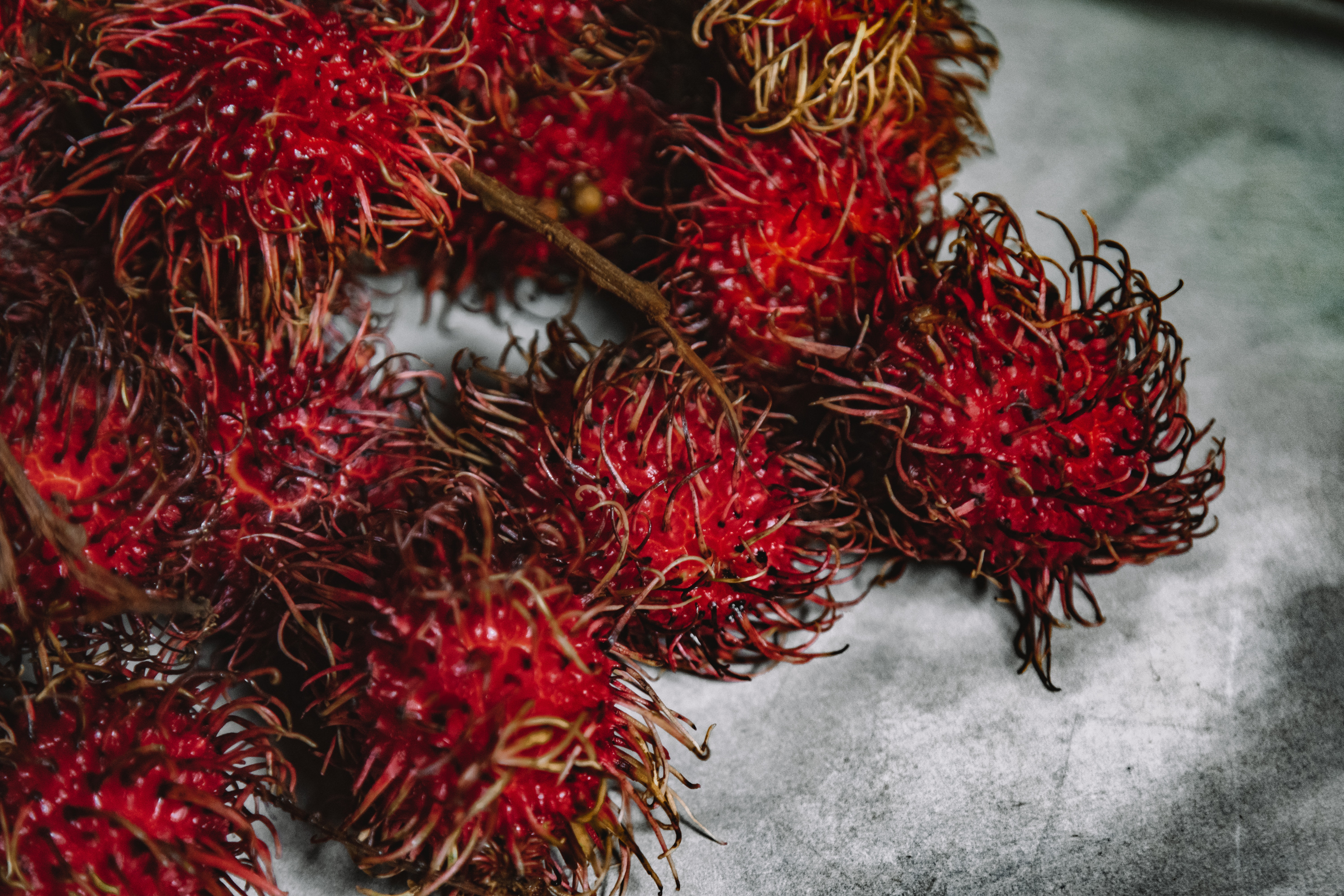 Rambutan is often consumed fresh and has a sweet and slightly acidic