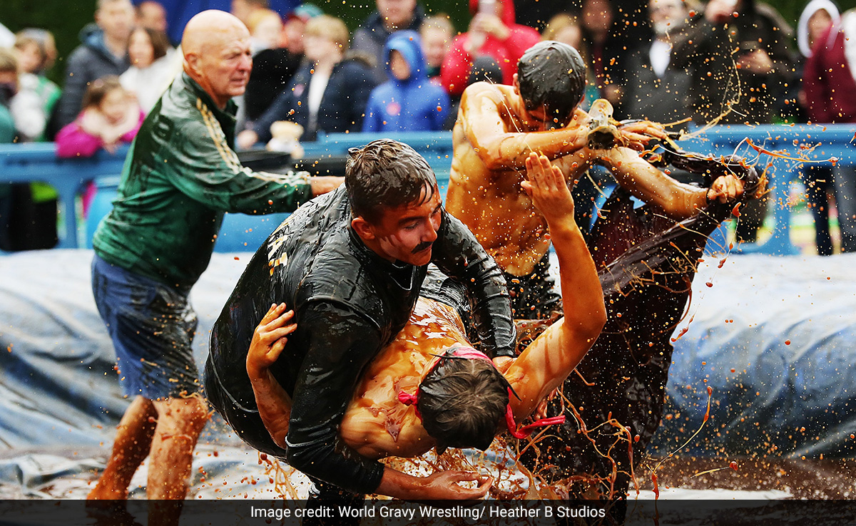 Watch: These Contestants Wrestled Each Other In A Pool Filled With Gravy, Here's Why