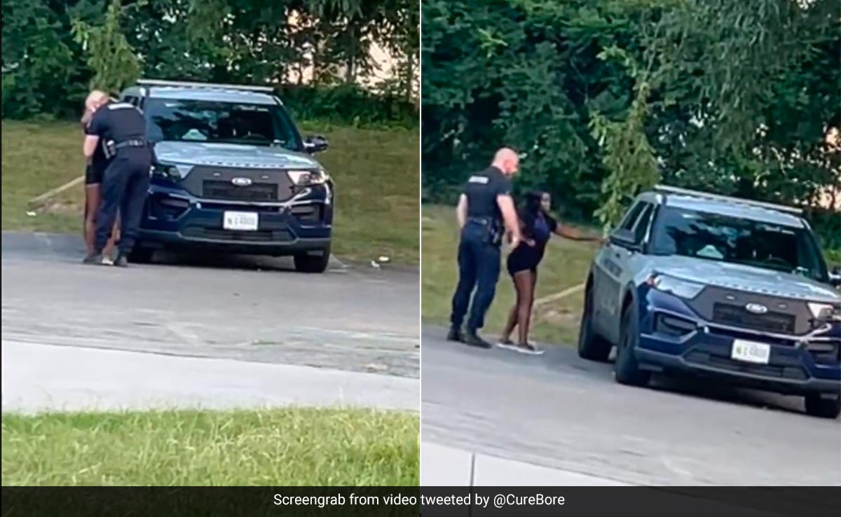 US Cop Caught On Video Kissing Woman And Climbing Into Police Car, Suspended