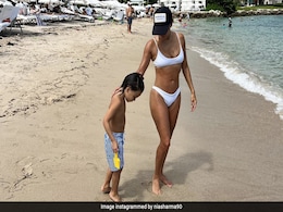 Eva Longoria's Motherhood Diaries Includes "Miami Things" Like Walks On The Beach With Her Son Santiago Eva Longoria's Motherhood Diaries Includes "Miami Things" Like Walks On The Beach With Her Son Santiago