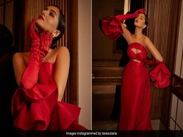 Tara Sutaria Brings Old World Charm To Life In A Red Cutout Gown And Dramatic Gloves Tara Sutaria Brings Old World Charm To Life In A Red Cutout Gown And Dramatic Gloves
