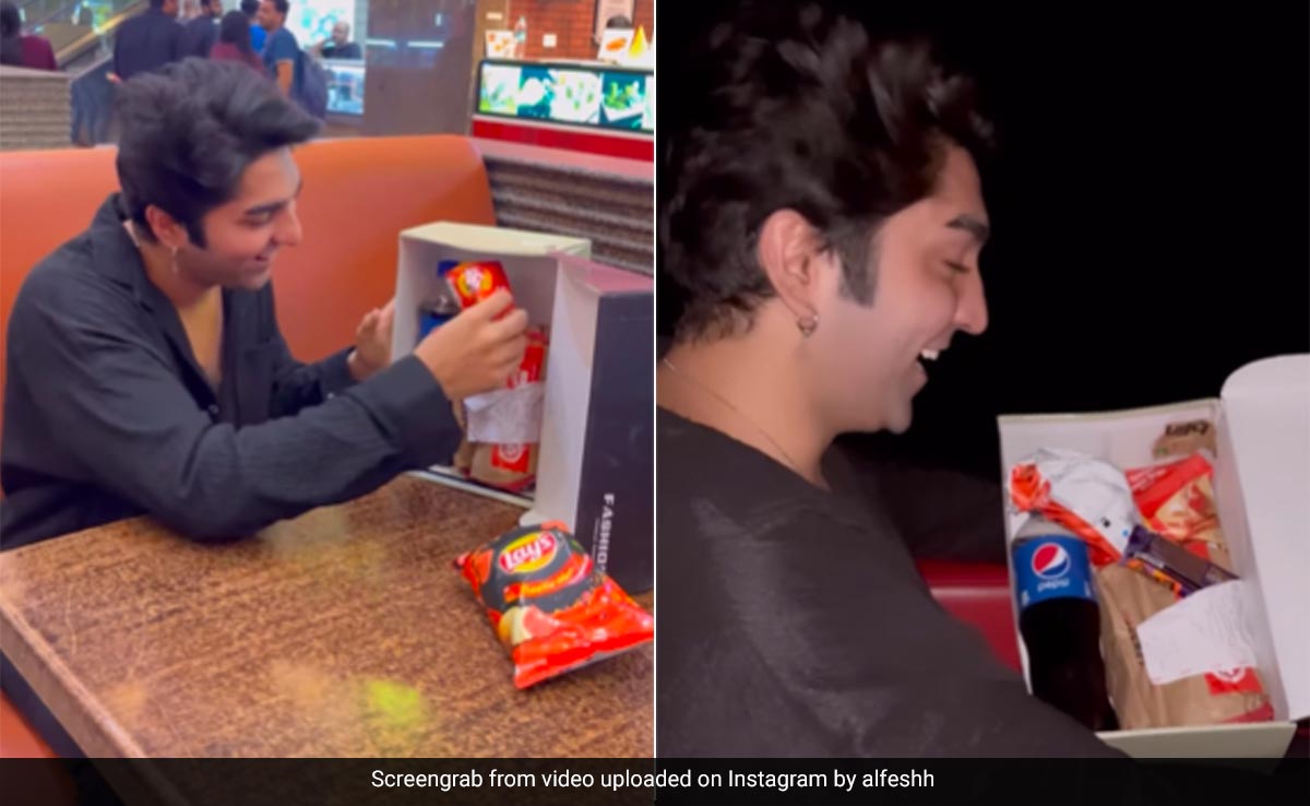 थिएटर में खाने की चीजें छिपाकर ले जाने के लिए शख्स ने निकाला स्मार्ट तरीका, Video वायरल हो गया