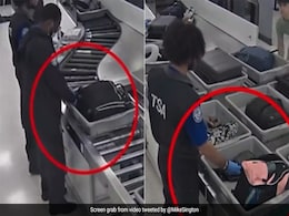 US Airport Officers Caught On Camera Stealing Money From Passengers' Bags US Airport Officers Caught On Camera Stealing Money From Passengers' Bags