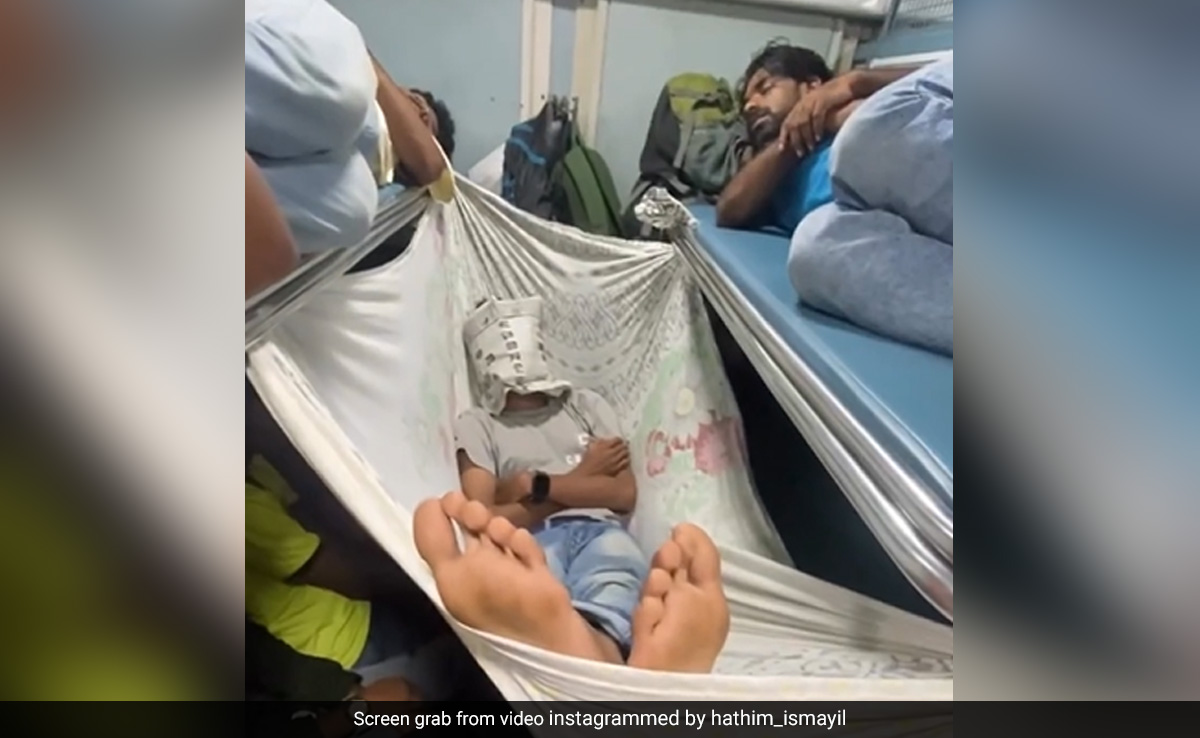 Watch: Railway Passenger Caught Sleeping In Makeshift Hammock Inside Crowded Train