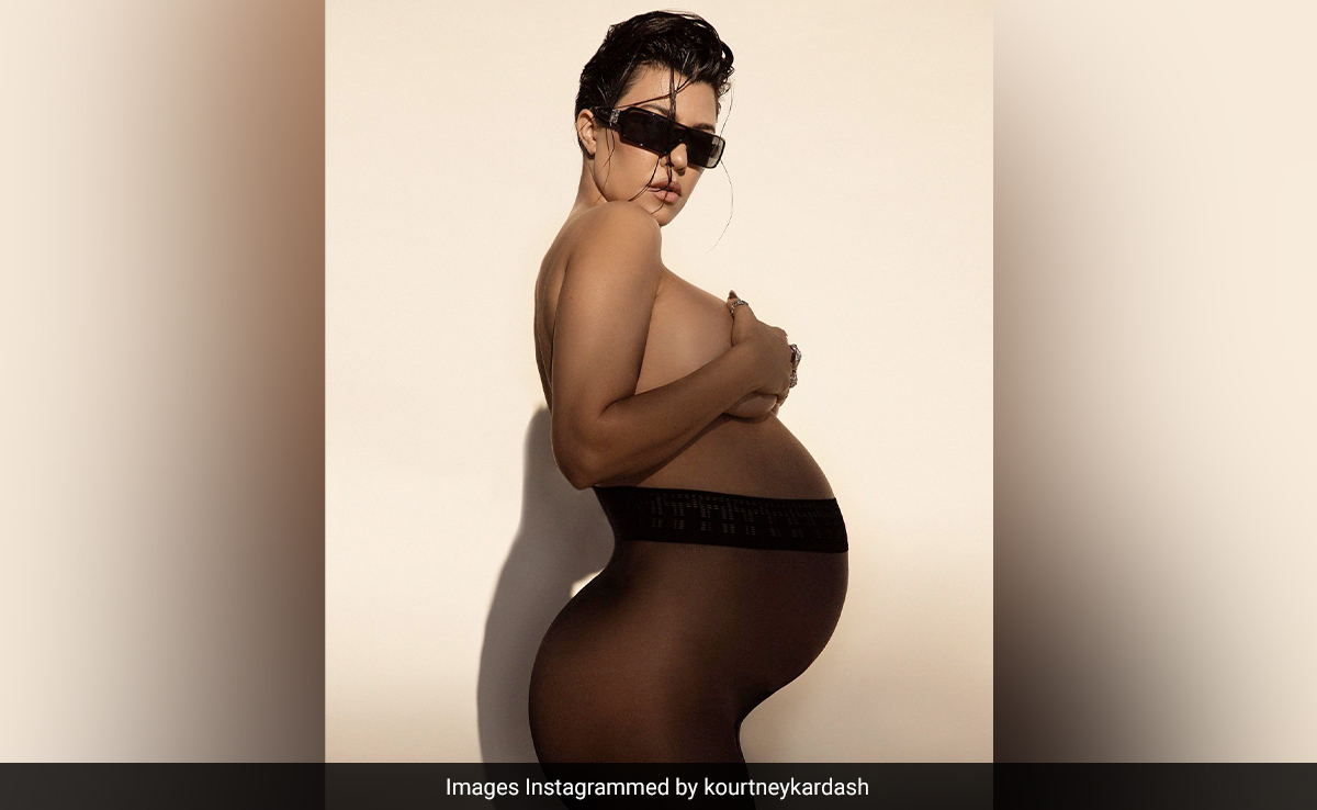 Kourtney Kardashian In Daring Black Stockings Gives Her Bump-Baring Maternity Style An Upgrade