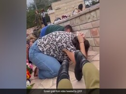 Video: Israelis Crouch At War Funeral, Rockets Explode In Background Video: Israelis Crouch At War Funeral, Rockets Explode In Background