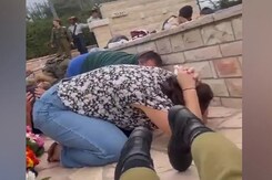 Video: Israelis Crouch At War Funeral, Rockets Explode In Background Video: Israelis Crouch At War Funeral, Rockets Explode In Background