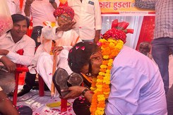 Rajasthan MLA Om Prakash Hudla Polishes Shoes, Touches Elderly Man's Feet With Forehead Rajasthan MLA Om Prakash Hudla Polishes Shoes, Touches Elderly Man's Feet With Forehead