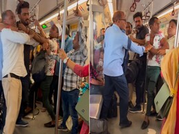 कुश्ती का अखाड़ा बनी दिल्ली मेट्रो, गुस्साए चचा ने लड़के पर जड़ा थप्पड़, धुनाई का वीडियो हुआ वायरल कुश्ती का अखाड़ा बनी दिल्ली मेट्रो, गुस्साए चचा ने लड़के पर जड़ा थप्पड़, धुनाई का वीडियो हुआ वायरल