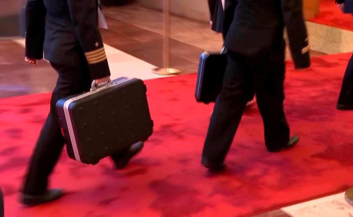 "There are certain suitcases without which no trip of Putins is complete," the Kremlin correspondents said. "There are certain suitcases without which no trip of Putins is complete," the Kremlin correspondents said.