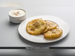 ​Holi 2026 Recipe: होली पर मीठे में जरूर बनाएं क्लासिक मालपुआ, झटपट नोट करें रेसिपी