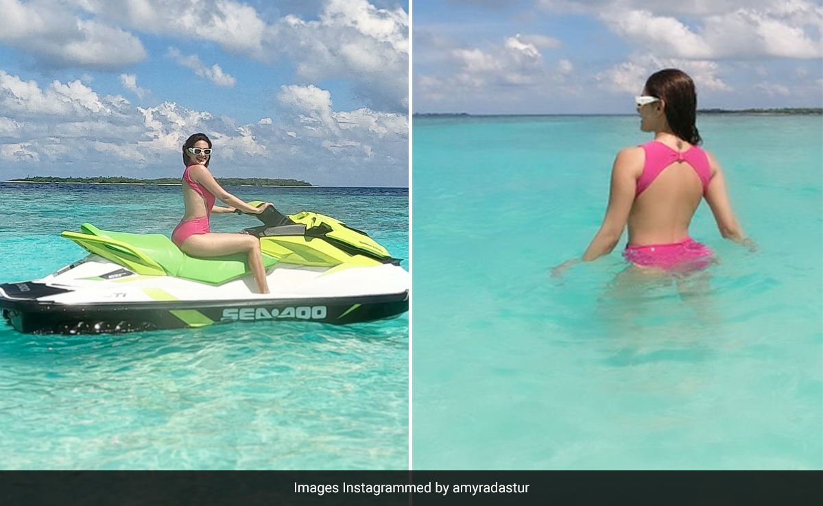 Amyra Dastur's Pink Cutout Swimsuit Serves The Most Gorgeous Contrast To Weekday Blues On Her Maldives Holiday