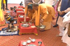 Yogi Adityanath Launches 'Hot Cooked Meal Scheme', Serves Food To Children Yogi Adityanath Launches 'Hot Cooked Meal Scheme', Serves Food To Children