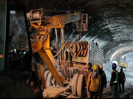 Uttarkashi Tunnel Collapse:" नई ड्रिल मशीन, 900 मिमी पाइप: जानें कैसे टनल में फंसे 40 मजदूरों को बचाने में जुटी है रेस्क्यू टीम? Uttarkashi Tunnel Collapse:" नई ड्रिल मशीन, 900 मिमी पाइप: जानें कैसे टनल में फंसे 40 मजदूरों को बचाने में जुटी है रेस्क्यू टीम?