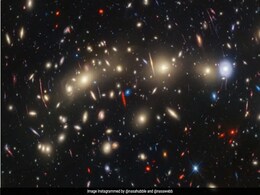 NASA's Webb And Hubble Team Up For Stunning View Of "Christmas Tree Galaxy Cluster" NASA's Webb And Hubble Team Up For Stunning View Of "Christmas Tree Galaxy Cluster"