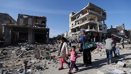 "We Will Rebuild Again": Palestinians In Gaza Return To Ruins Of Home