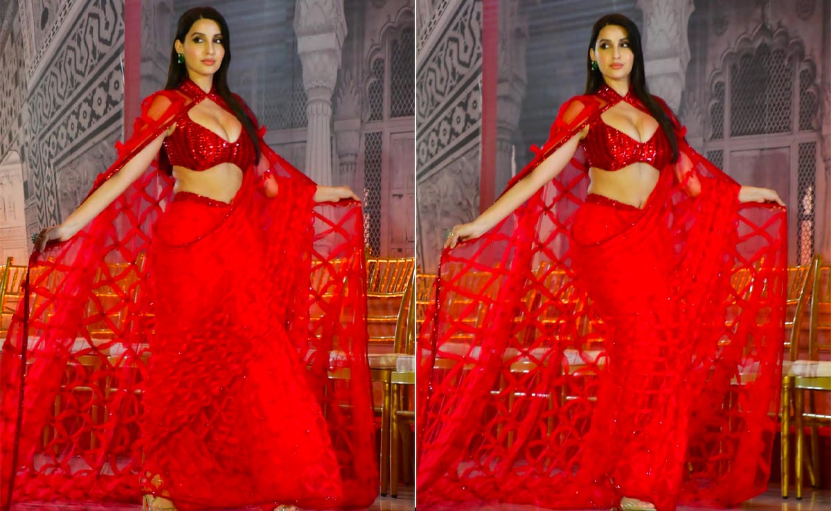 Nora Fatehi In A Red Manish Malhotra <i>Saree</i> Brings High Flames And High Voltage Glam At The Jio World Plaza Inauguration