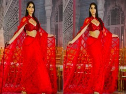 Nora Fatehi In A Red Manish Malhotra <i>Saree</i> Brings High Flames And High Voltage Glam At The Jio World Plaza Inauguration Nora Fatehi In A Red Manish Malhotra <i>Saree</i> Brings High Flames And High Voltage Glam At The Jio World Plaza Inauguration
