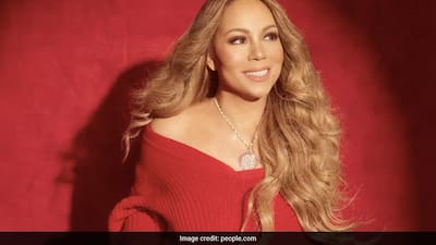 mariah carey red dress rocks festive minidress in Aspen while shopping Barbie Signature 2023 Mariah Carey