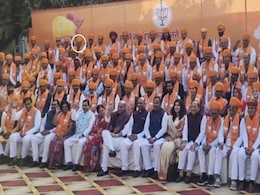 He Sat In Last Row Of BJP Group Pic, Was Named Chief Minister Minutes Later He Sat In Last Row Of BJP Group Pic, Was Named Chief Minister Minutes Later